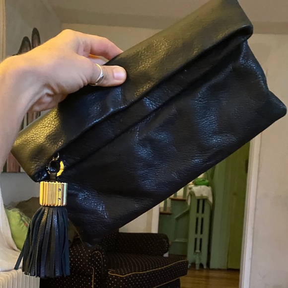 India Hicks Carmen fold over Black Leather Clutch with tassel - Picture 3 of 8